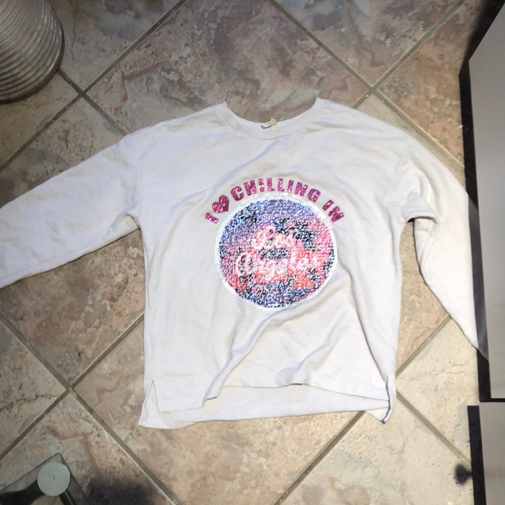 A white switch sweater
